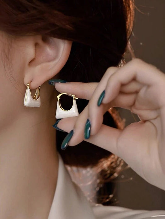 Enamelled bag shape earrings.