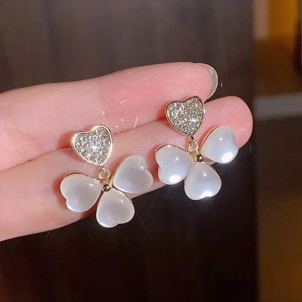 Opal heart clover drop earrings.