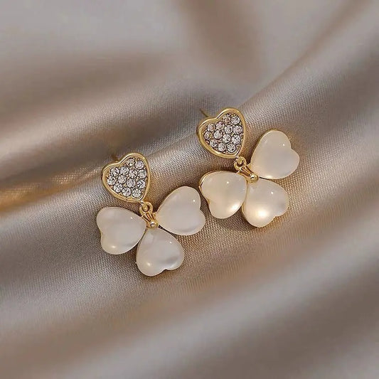 Opal heart clover drop earrings.