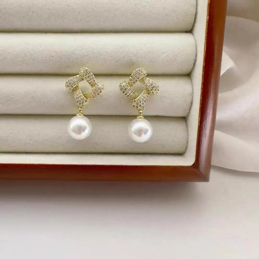 Geometric square pearl earrings.
