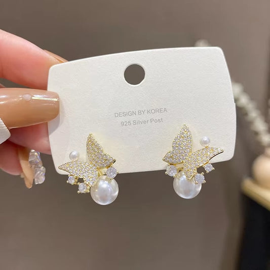 stones inlaid pearl Butterfly stud earrings.