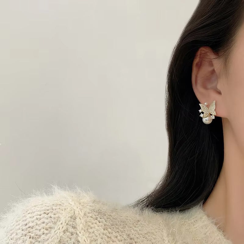 stones inlaid pearl Butterfly stud earrings.