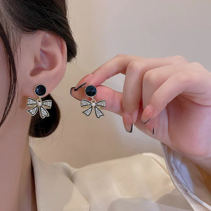 korean style black bow earrings.