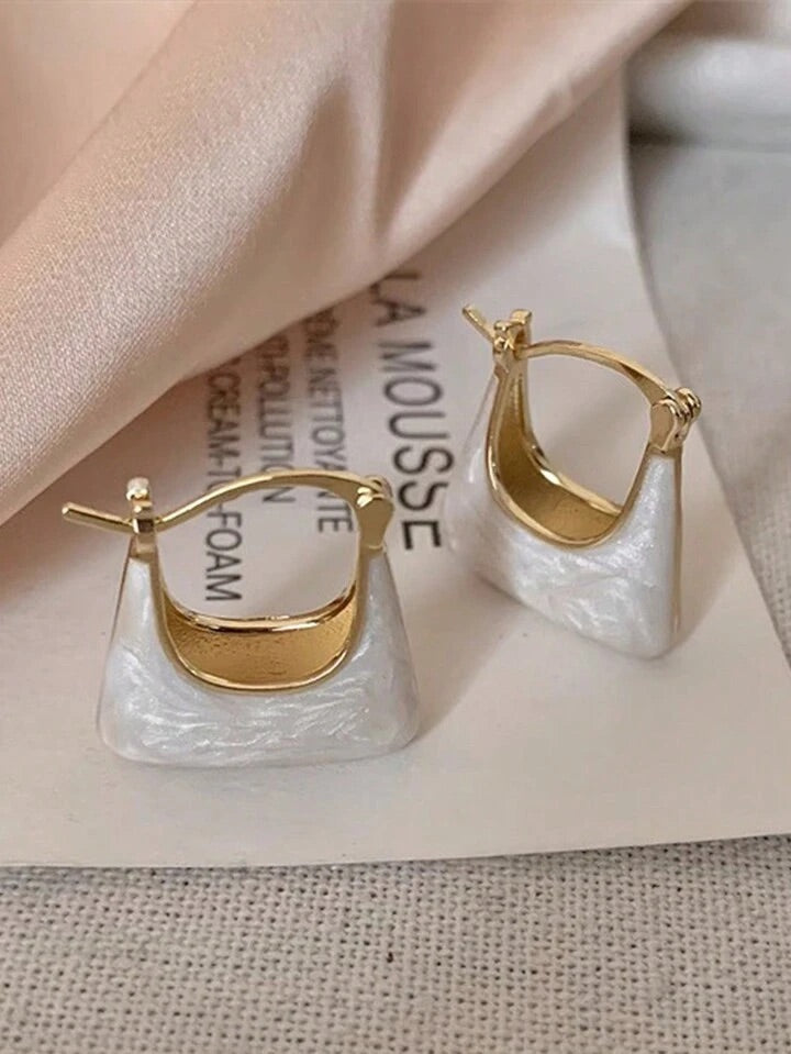 Enamelled bag shape earrings.