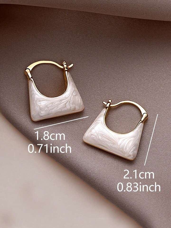 Enamelled bag shape earrings.
