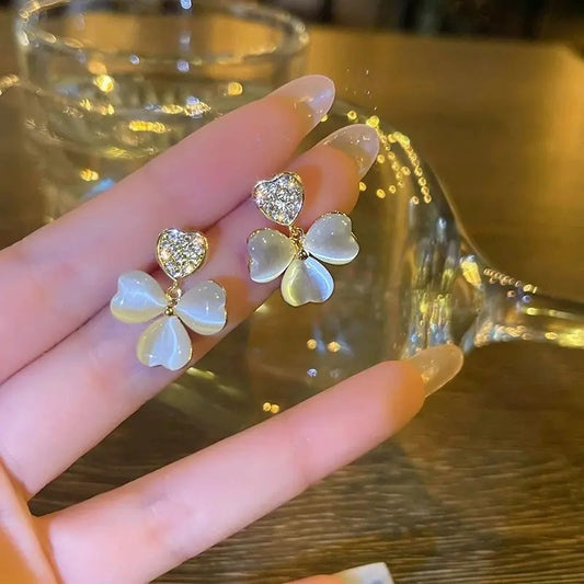 Opal heart clover drop earrings.